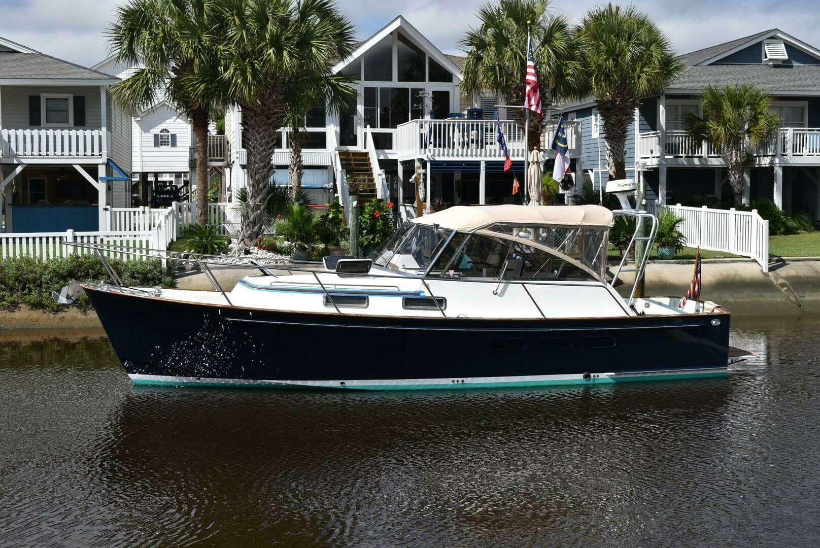 1999 Legacy 34 Express - photo 1 of 24
