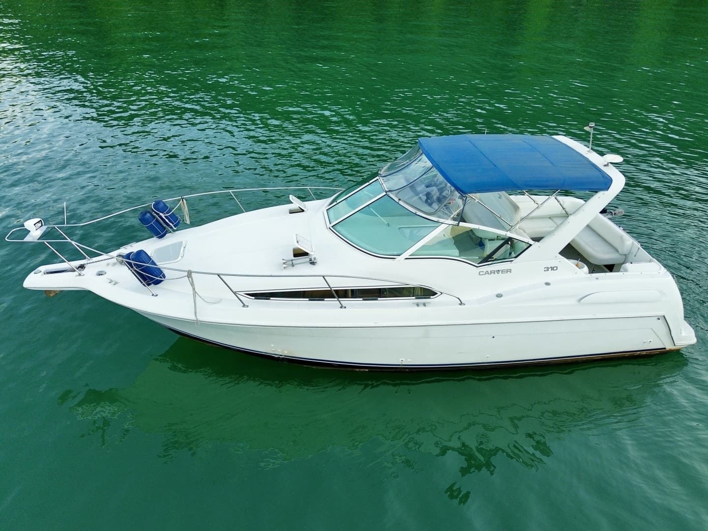 1996 Carver 310 Mid Cabin Express - photo 1 of 214