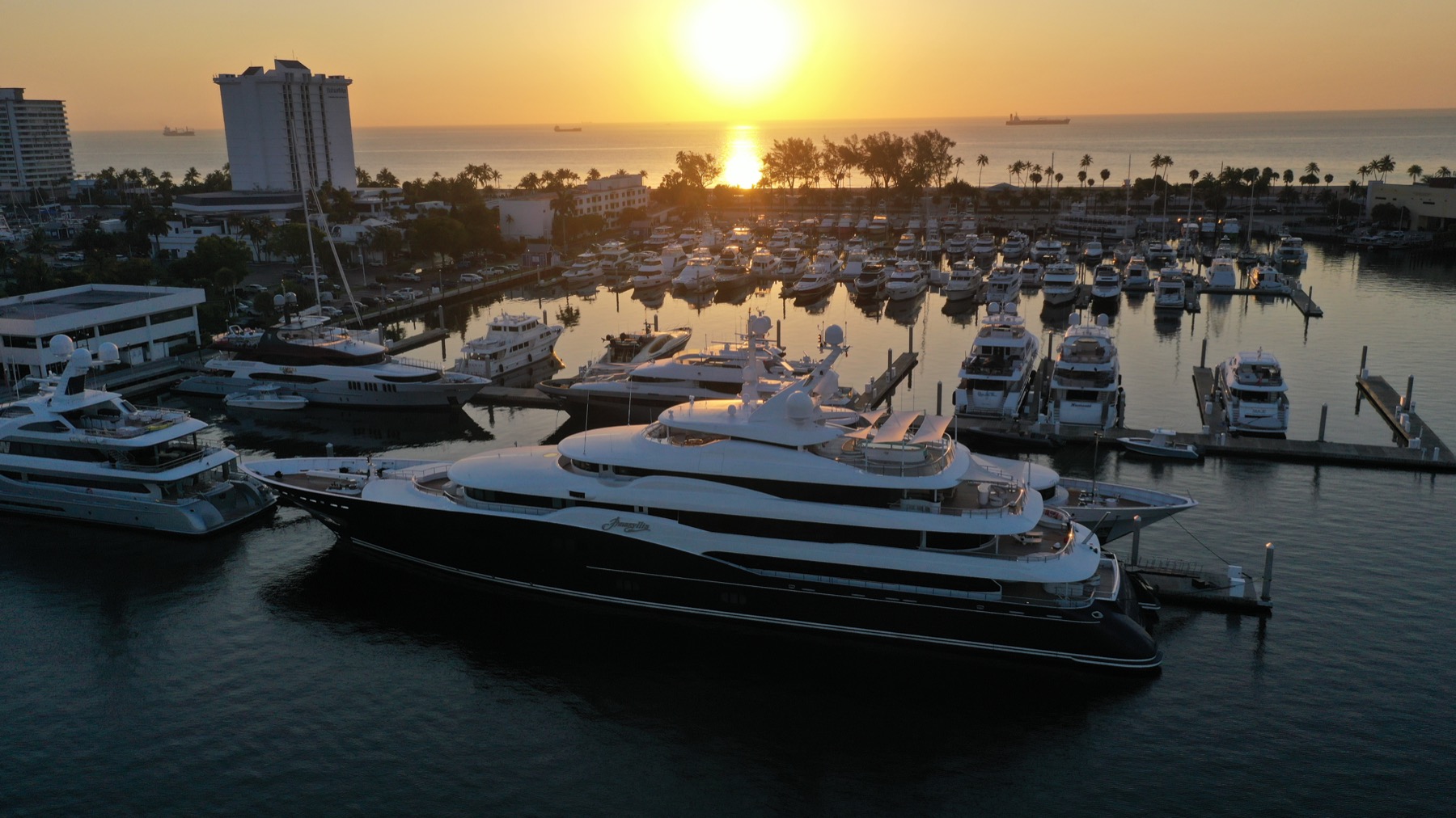 Yachts berthed in a Fort Lauderdale marina at sunset