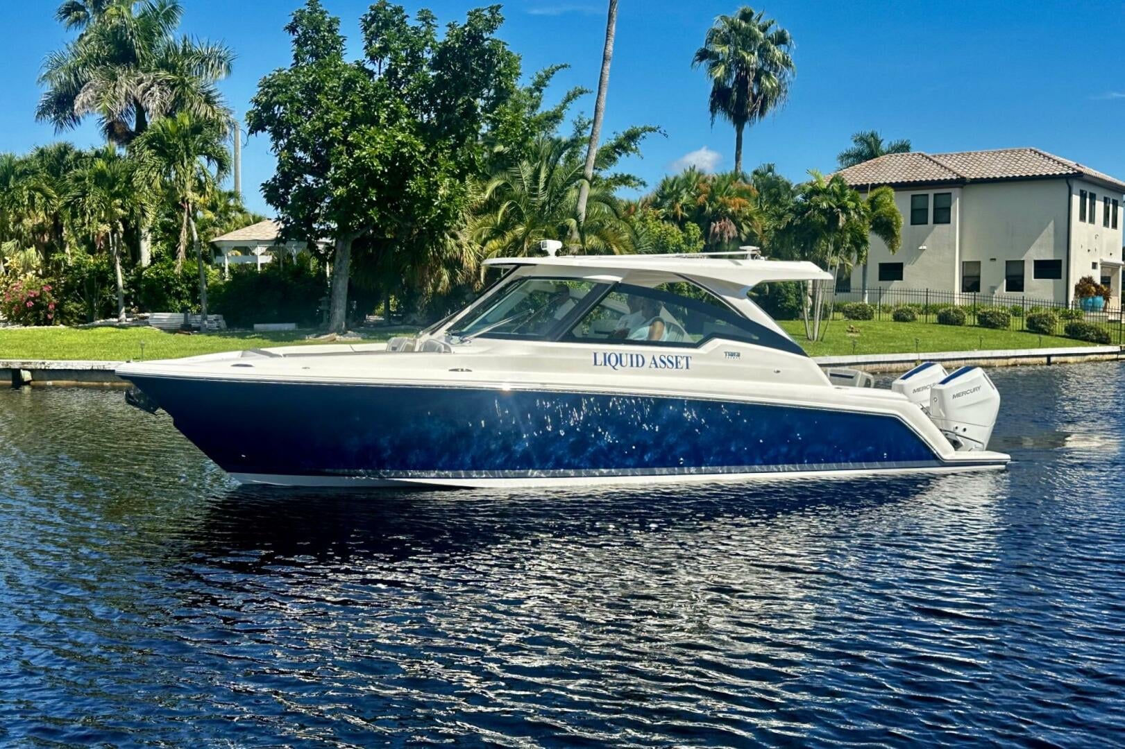 Liquid Asset, the 2024 Tiara Sport 34 LX, on a Cape Coral canal